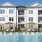 Apartments in Huntsville for Rent - Ariza Research - Pool with Lounge Chairs, Yellow Cabanas, and View of Apartment Complex