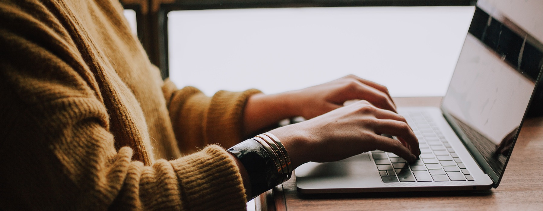 Person on a computer typing